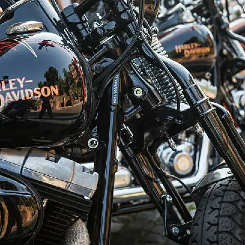 Rome, Italy - June 15, 2013: The Harley-Davidson 110th Anniversary Celebration in Rome: group of motorbikes parked in front of the Coliseum.